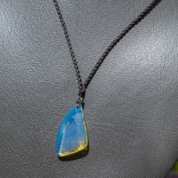 electric_blue_amber_sail_shape_807654095