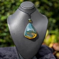 genuine_bluish_green_dominican_amber_talisman