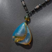genuine_dominican_sky_blue_amber_pendant_378497385